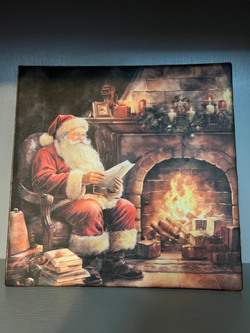 Sant Claus by the Fireplace
